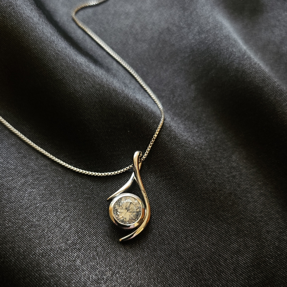 Sophisticated Sterling Silver Teardrop Necklace with White Sapphire